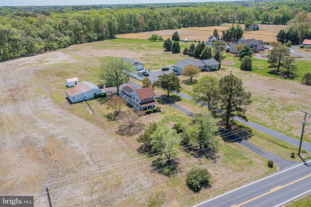 drone / aerial view with a rural view and a forest view