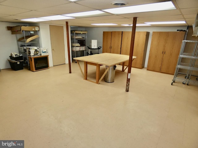 recreation room featuring visible vents and a paneled ceiling