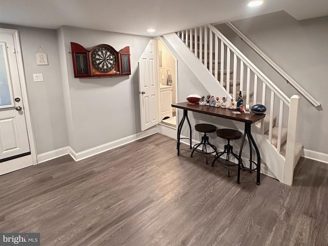 entrance foyer with stairway, recessed lighting, baseboards, and dark wood finished floors