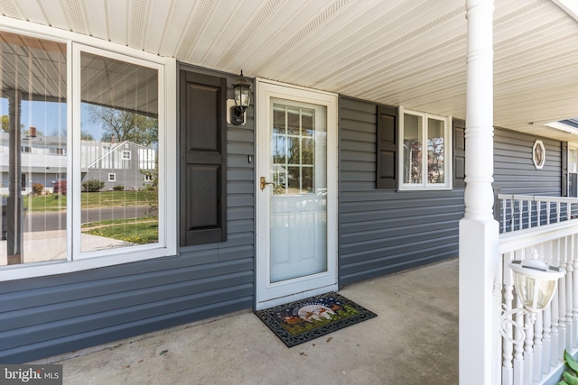 doorway to property with a porch