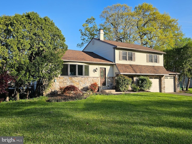 tri-level home with a front lawn, aphalt driveway, a garage, stone siding, and a chimney