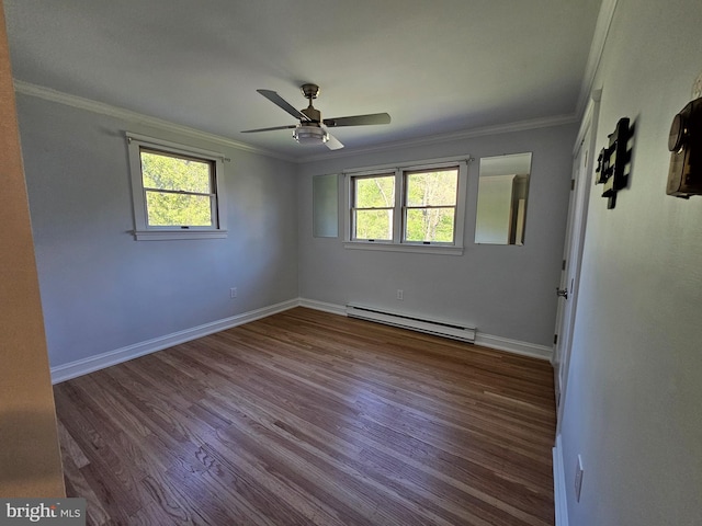empty room featuring ornamental molding, a ceiling fan, a baseboard heating unit, and a wealth of natural light