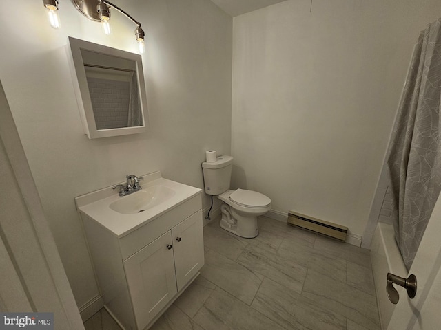 bathroom with vanity, toilet, marble finish floor, baseboards, and a baseboard radiator