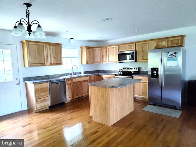 1048 Mill Rd, Woodstock, VA 22664 - kitchen featuring dark countertops, appliances with stainless steel finishes, a sink, and dark wood-type flooring