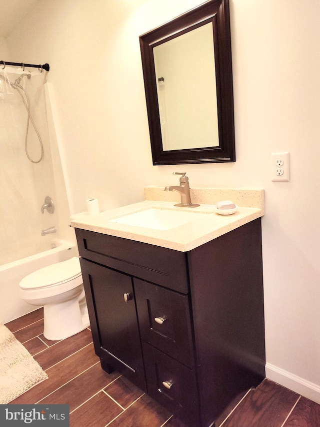 1048 Mill Rd, Woodstock, VA 22664 - full bath with vanity, shower / bathing tub combination, wood finished floors, and toilet