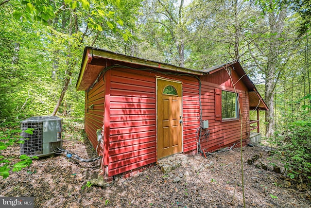 view of outbuilding featuring cooling unit