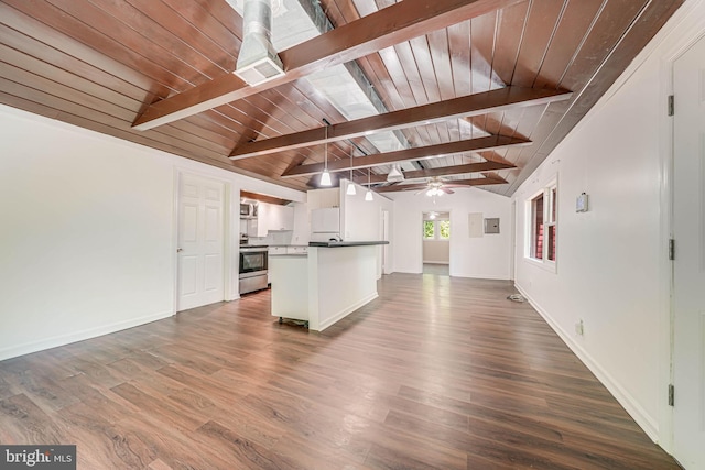 kitchen with vaulted ceiling with beams, open floor plan, wood ceiling, and appliances with stainless steel finishes