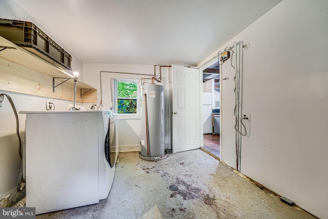 washroom with gas water heater, laundry area, and washer / clothes dryer
