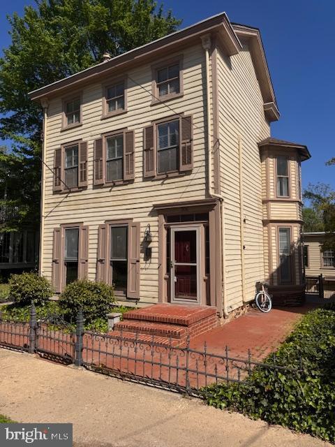 306 Bohemia Ave, Chesapeake City, MD 21915 - italianate-style house featuring fence private yard