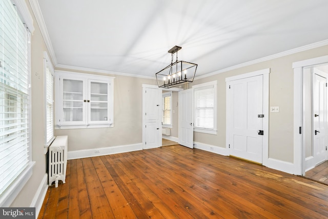 306 Bohemia Ave, Chesapeake City, MD 21915 - foyer with wood-type flooring, ornamental molding, baseboards, and a notable chandelier