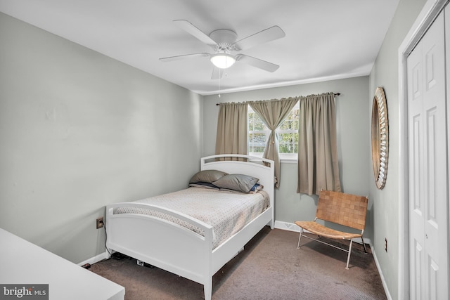 carpeted bedroom with baseboards, a ceiling fan, and a closet