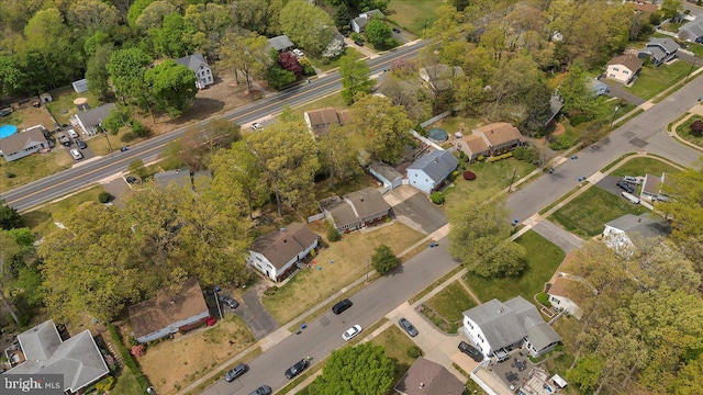 birds eye view of property with a residential view