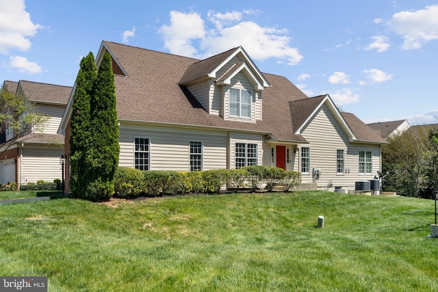 42955 Chancery Ter, Ashburn, VA 20148 - cape cod home featuring a shingled roof, a front lawn, and central air condition unit