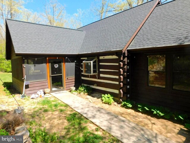 21165 State Road 55, Wardensville, WV 26851 - view of front of property with a shingled roof and log siding
