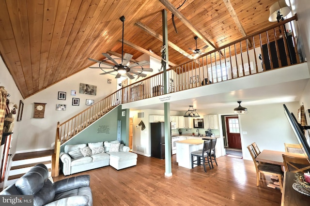 18 Boyds Hollow Rd, Biglerville, PA 17307 - living area with wooden ceiling, ceiling fan, high vaulted ceiling, stairs, and wood finished floors