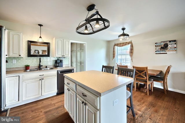 18 Boyds Hollow Rd, Biglerville, PA 17307 - kitchen featuring stainless steel dishwasher, a sink, a kitchen breakfast bar, and light countertops
