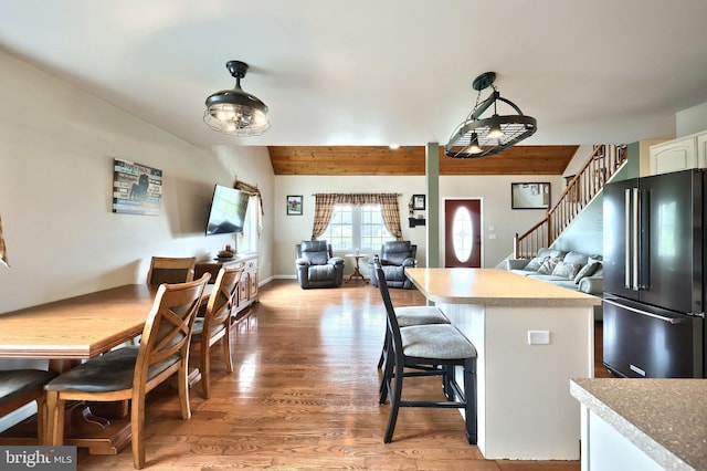 18 Boyds Hollow Rd, Biglerville, PA 17307 - kitchen with high end fridge, open floor plan, light wood-style floors, pendant lighting, and beam ceiling