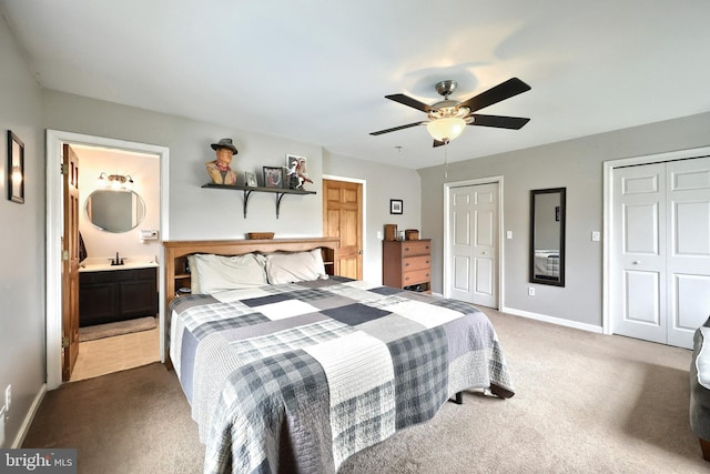 18 Boyds Hollow Rd, Biglerville, PA 17307 - carpeted bedroom with two closets, baseboards, ensuite bath, and a ceiling fan