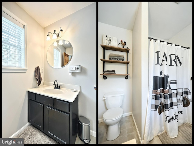 18 Boyds Hollow Rd, Biglerville, PA 17307 - full bathroom with baseboards, vanity, toilet, and a shower with shower curtain