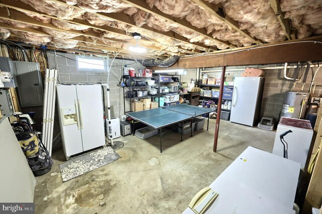 18 Boyds Hollow Rd, Biglerville, PA 17307 - basement with white refrigerator with ice dispenser, freestanding refrigerator, electric water heater, and electric panel