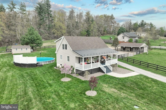 18 Boyds Hollow Rd, Biglerville, PA 17307 - back of house featuring an outbuilding, an exterior structure, and metal roof