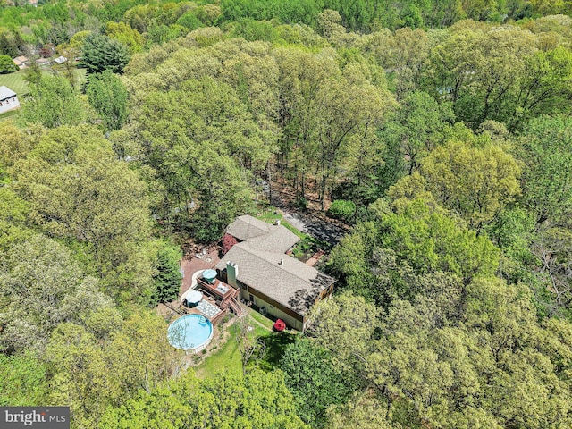 aerial view featuring a forest view