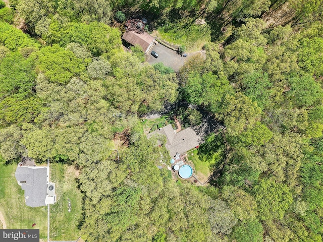 drone / aerial view with a forest view