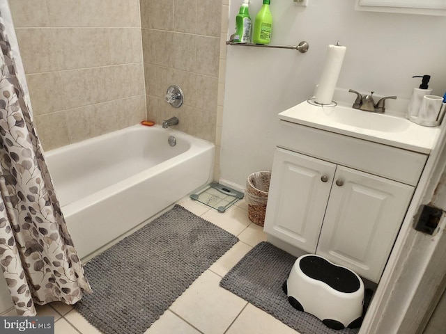 bathroom featuring tile patterned floors, shower / bath combo, and vanity