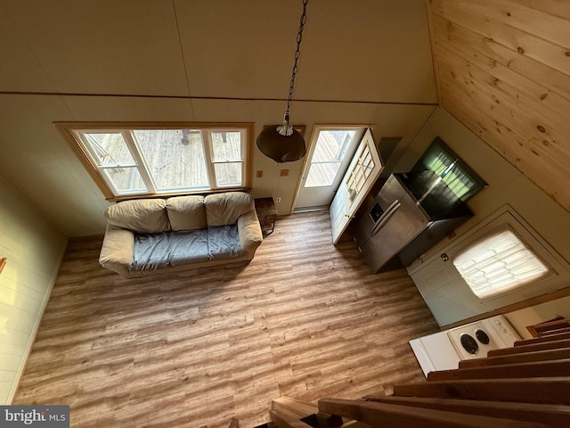 unfurnished living room featuring wood finished floors