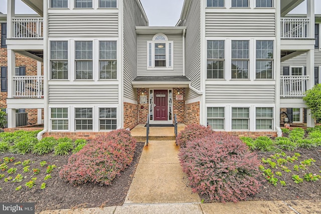 1317 Greenbriar Cir Unit 7-1317, Pikesville, MD 21208 - view of front of property featuring brick siding