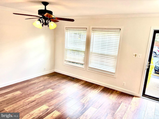 402 E Furman Dr E Unit 278, Sterling, VA 20164 - spare room featuring ornamental molding, baseboards, wood finished floors, and ceiling fan