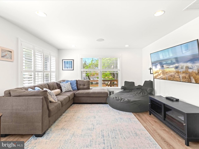327 Oakwood St, Bethany Beach, DE 19930 - living room with light wood-style flooring and recessed lighting