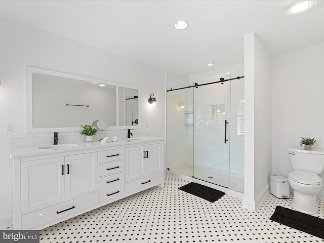 327 Oakwood St, Bethany Beach, DE 19930 - full bath featuring a shower stall, toilet, baseboards, recessed lighting, and double vanity