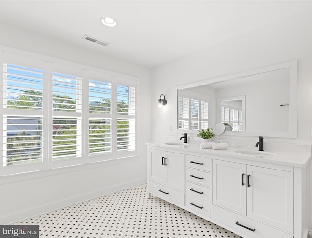 327 Oakwood St, Bethany Beach, DE 19930 - full bathroom featuring baseboards, double vanity, and recessed lighting