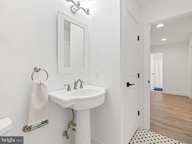 327 Oakwood St, Bethany Beach, DE 19930 - bathroom with toilet, recessed lighting, baseboards, and a sink