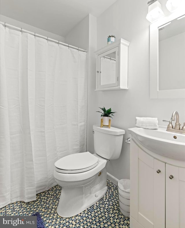 327 Oakwood St, Bethany Beach, DE 19930 - bathroom featuring toilet and vanity