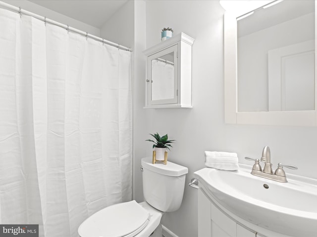 327 Oakwood St, Bethany Beach, DE 19930 - bathroom featuring a sink and toilet
