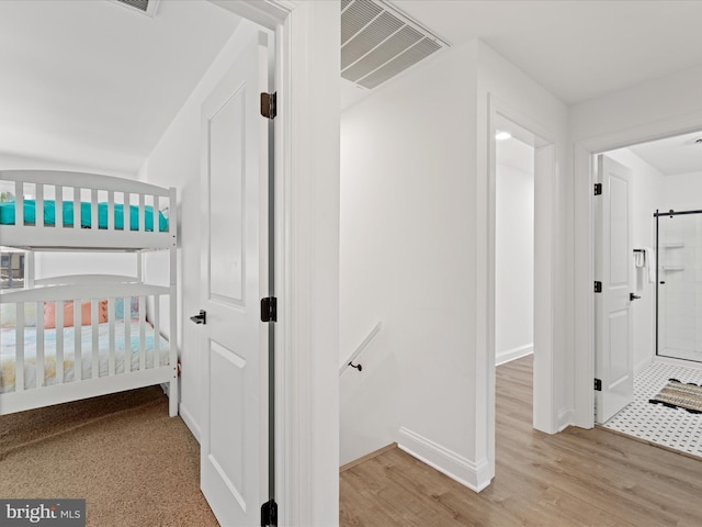 327 Oakwood St, Bethany Beach, DE 19930 - hallway featuring baseboards and wood finished floors