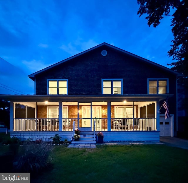 327 Oakwood St, Bethany Beach, DE 19930 - back of property featuring a porch and a yard