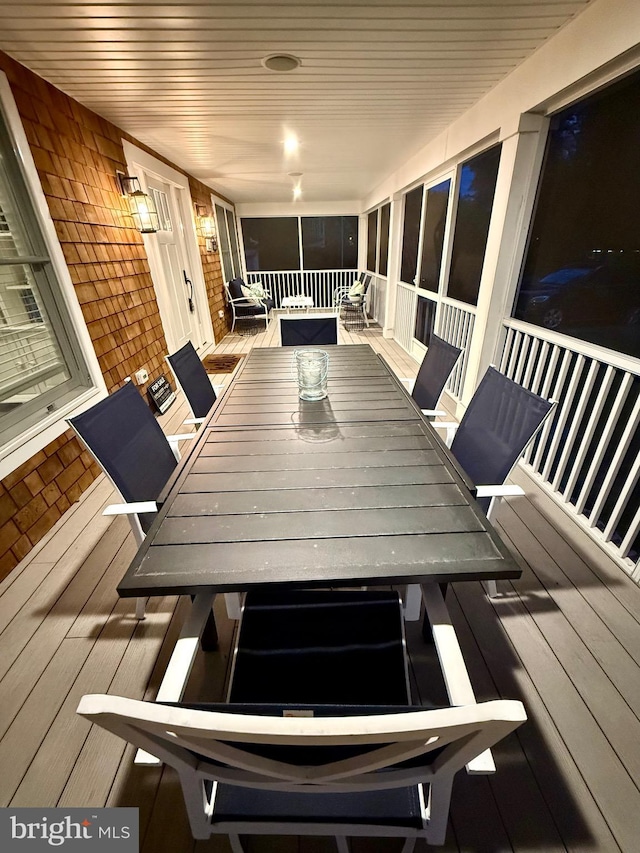 327 Oakwood St, Bethany Beach, DE 19930 - sunroom with outdoor dining space