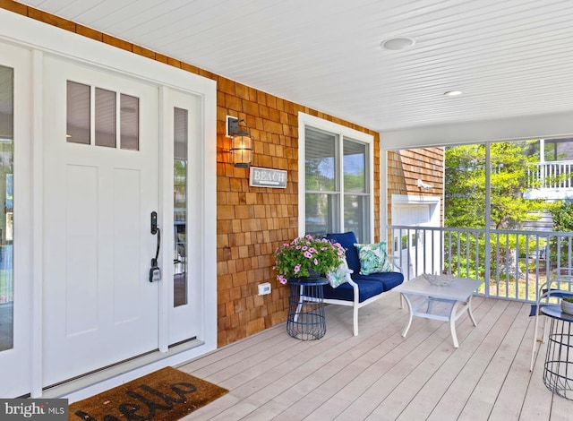327 Oakwood St, Bethany Beach, DE 19930 - wooden deck featuring a porch