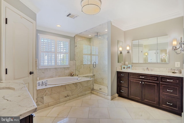 full bathroom featuring a bath, visible vents, a shower stall, vanity, and ornamental molding
