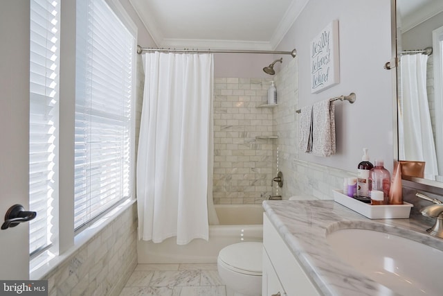 bathroom with vanity, ornamental molding, marble finish floor, shower / tub combo with curtain, and toilet