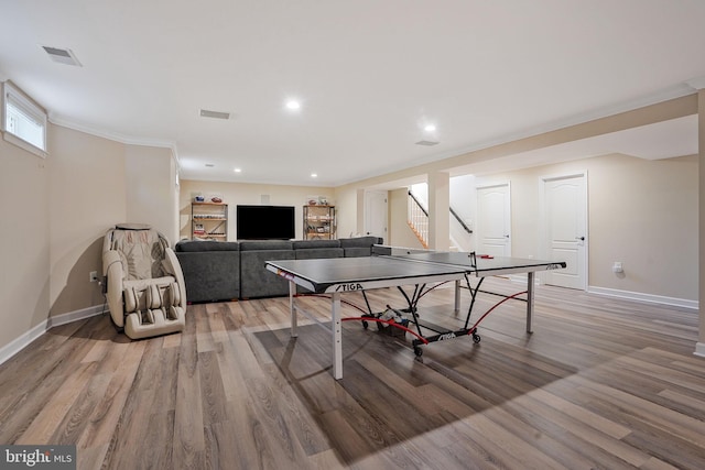 game room featuring baseboards, recessed lighting, wood finished floors, and visible vents