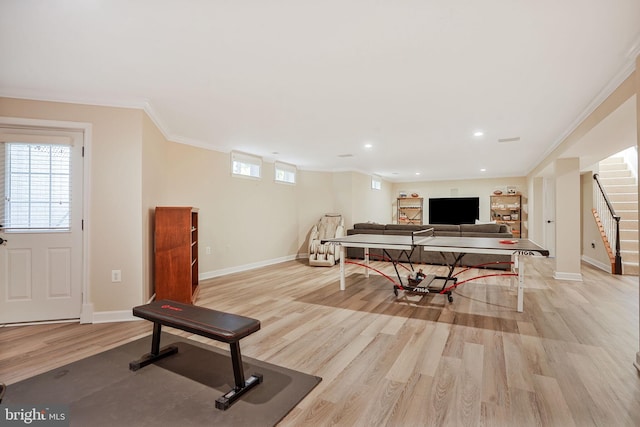 rec room featuring recessed lighting, baseboards, ornamental molding, and light wood finished floors
