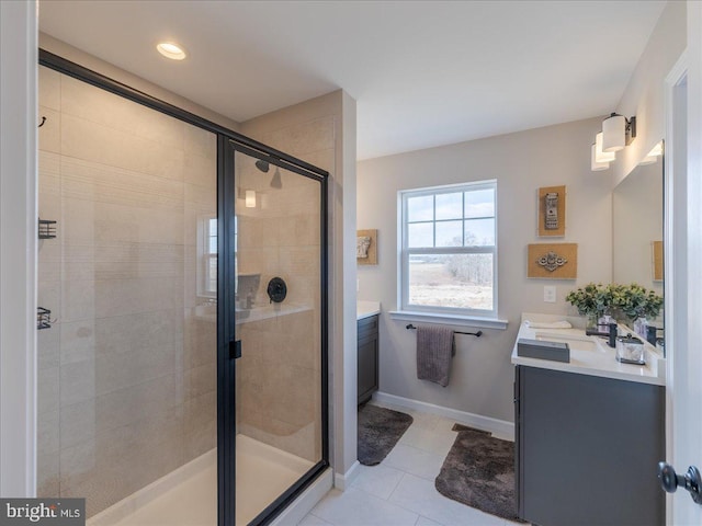 190 Petrelia Dr, Honey Brook, PA 19344 - bathroom featuring vanity, tile patterned flooring, baseboards, and a stall shower