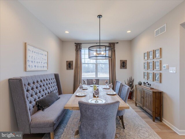 190 Petrelia Dr, Honey Brook, PA 19344 - dining space featuring visible vents, baseboards, light wood-type flooring, recessed lighting, and a notable chandelier