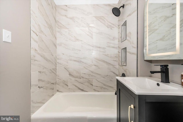 bathroom featuring vanity and bathtub / shower combination