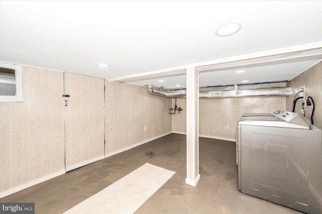 finished basement featuring recessed lighting and washing machine and clothes dryer