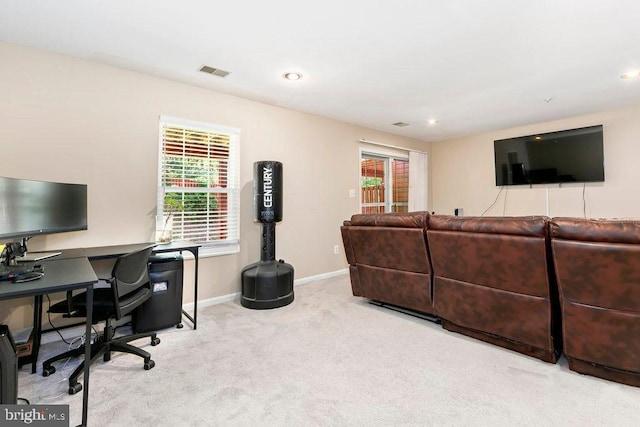 carpeted office space with visible vents, baseboards, and recessed lighting